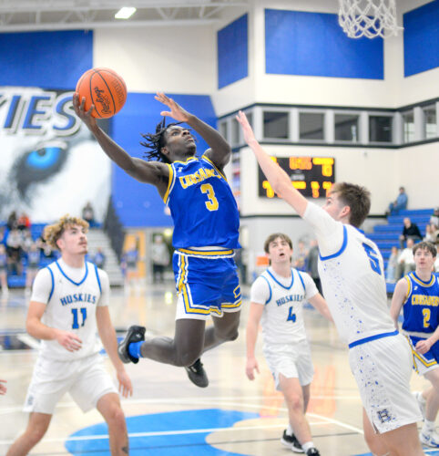 Huskies claw back to top Catholic Central